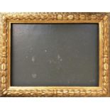 A late 19th century carved gesso picture frame, internal dimensions 49.5x69cm; together with one