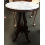 A marble topped oval occasional table, 47x61x72cmH