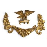 Five giltwood gesso carvings: a pair of scrolling foliate surrounds, one other similar, a small
