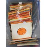 A box of vinyl singles, to include ABBA, Art Garfunkel, Adam and the Ants, the Bee Gees, Blondie,