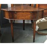 An early 20th century corner side table with two fitted canteen drawers, containing a large EPNS