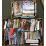 Two boxes containing a large quantity of good DVDs, approximately 75; and a number of CDs
