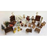 A small quantity of dolls house furniture, to include ceramic bathroom suite, bureau, grand piano,