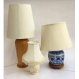 A blue and white ginger jar converted as a table lamp; together with a large turned wooden table