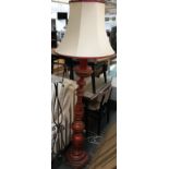 A red painted and gilt Oriental turned standard lamp, with shade 178cmH