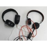 A Jabra on ear headset, together with a pair of Silent Noize Events silent disco headphones