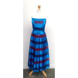 A 1970s/80s Yvette Creation a la mode de Paris strapless dress, in blue, red and navy striped