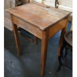A vintage school desk with inkwell and hinged lid, 56x46x76cmH
