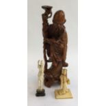 A Chinese carved hardwood figure of the mystic Shou Lao (af), with inlaid teeth, 36cmH; together