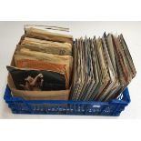 A small box of vinyl singles to include Roy Orbison, Boney M, Elvis Presley, Shaken Stephens etc