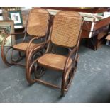 A pair of Thonet style bentwood rocking chairs, with caned seats and backs