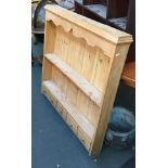 A pine hanging shelf, two shelves with five small drawers below, 94cmW