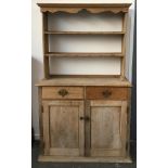 A 19th century stripped oak kitchen dresser, 111x46x185cmH