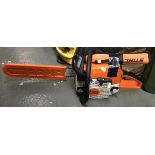 A Stihl M5250 petrol chainsaw with 16.5 inch bar and sharpener, almost unused condition