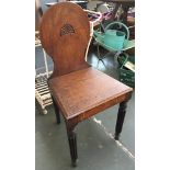 A 19th century hall chair, on reeded legs