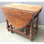 An oval oak gateleg table, turned supports, 91cmW