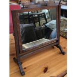 A Regency mahogany adjustable dressing mirror, on reeded supports, original glass, 42.5cmW