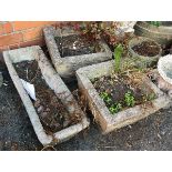 Two square composite stone planters 36cm2; together with a composite stone trough 66cmL