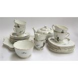 A Delphine china teaset, Kingfisher decoration comprising saucers (8), teacups (6), sideplates (