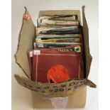 A box of vinyl singles to include Slade, Duran Duran, Haircut 100, etc