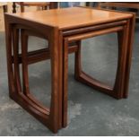 A nest of three mid century tables, largest 53.5cmW