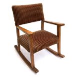 An oak child's rocking chair upholstered in striped fabric, 57cmH