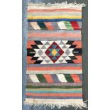 A small South American rug, 122x67cm