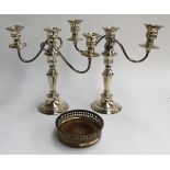 A pair of three arm silver plated candlesticks, each 28cmH