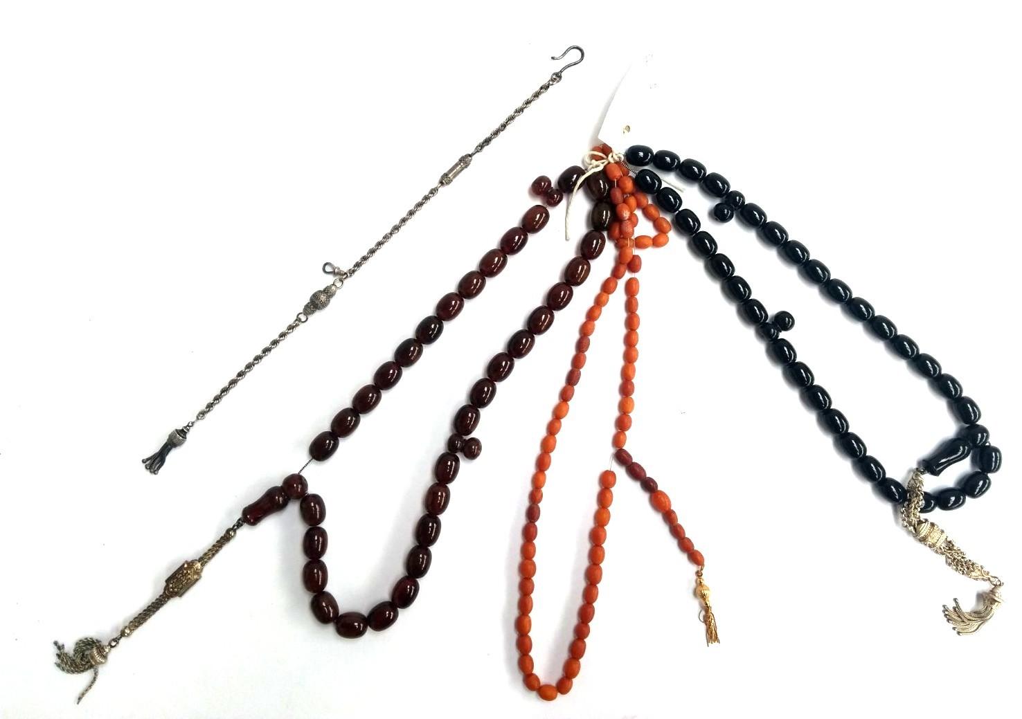 Beads with gold tassel marked 375 UnoAerre plus two other sets of beads with white metal tassels and