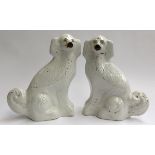 A pair of Staffordshire spaniels, approximately 33.5cmH