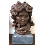 A resin bust of a young woman on slate plinth, approx. 46cmH