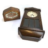 An Art Deco mantel clock; together with an oak cased wall clock with eight day striking movement