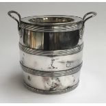 A silver plated wine cooler, crested, in the form of a coopered barrel, double skinned with