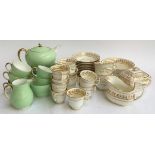 A 19th century gilt part tea service comprising teapot, teacups, saucers, sugar bowl etc; together