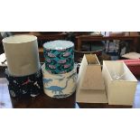 A selection of seven decorative lampshades of various sizes
