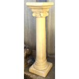 A composite stone garden sun dial stand in the form of a fluted ionic column, 84cmH