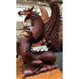 A large hardwood Oriental winged dragon (some damage), 68.5cmH