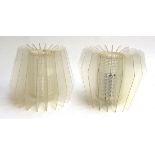 A pair of mid-century acrylic finned ceiling light shades