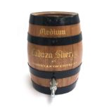 A metal banded cadoza sherry barrel, 28cmH