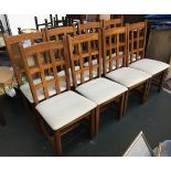 A set of eight contemporary oak dining chairs