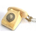 A vintage rotary dial telephone