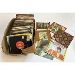 A small box of vinyl singles to include Paul McCartney, Cliff Richard, a number of vinyl in handmade