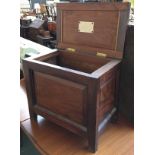 A teak workbox, with fielded panel sides, 57x35x52cmH