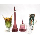 A studio glass vase; a tall striped cranberry glass vase with stopper, with matching jar; jug; and