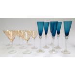 A collection of six blue wine glasses, together with eight cocktail glasses engraved with grape