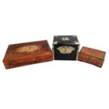 A carved wooden jewellery box with inlaid decoration; a black lacquered box with removable tray