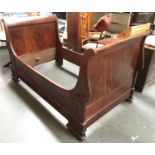 A 19th century oak and mahogany veneer French sleigh bed, 114cmW