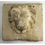 A garden wall plaque water spout, modelled as a lion mask