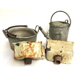 A galvanised pan and watering can, aluminium pan, and two cast iron downpipe hoppers
