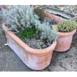 A pair of terracotta oblong planters, 69cmL (2)